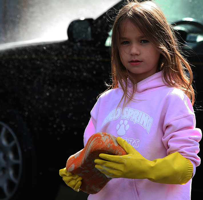 Girl washing cars
