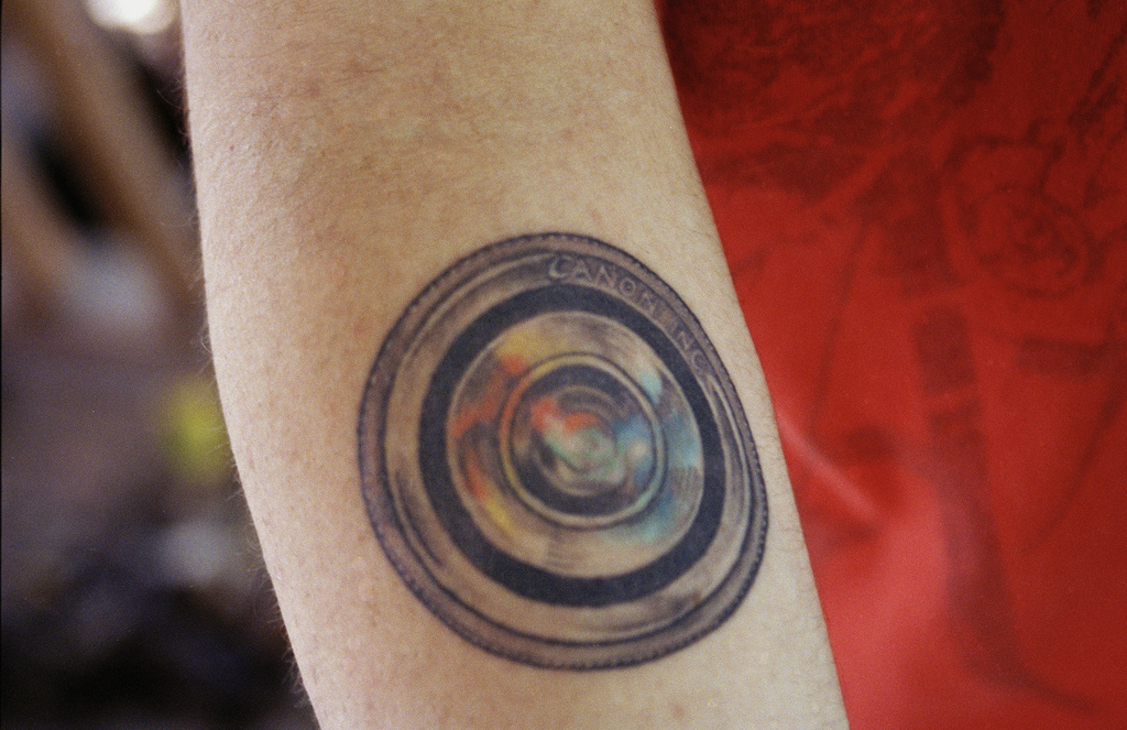 tattoo of a camera lens